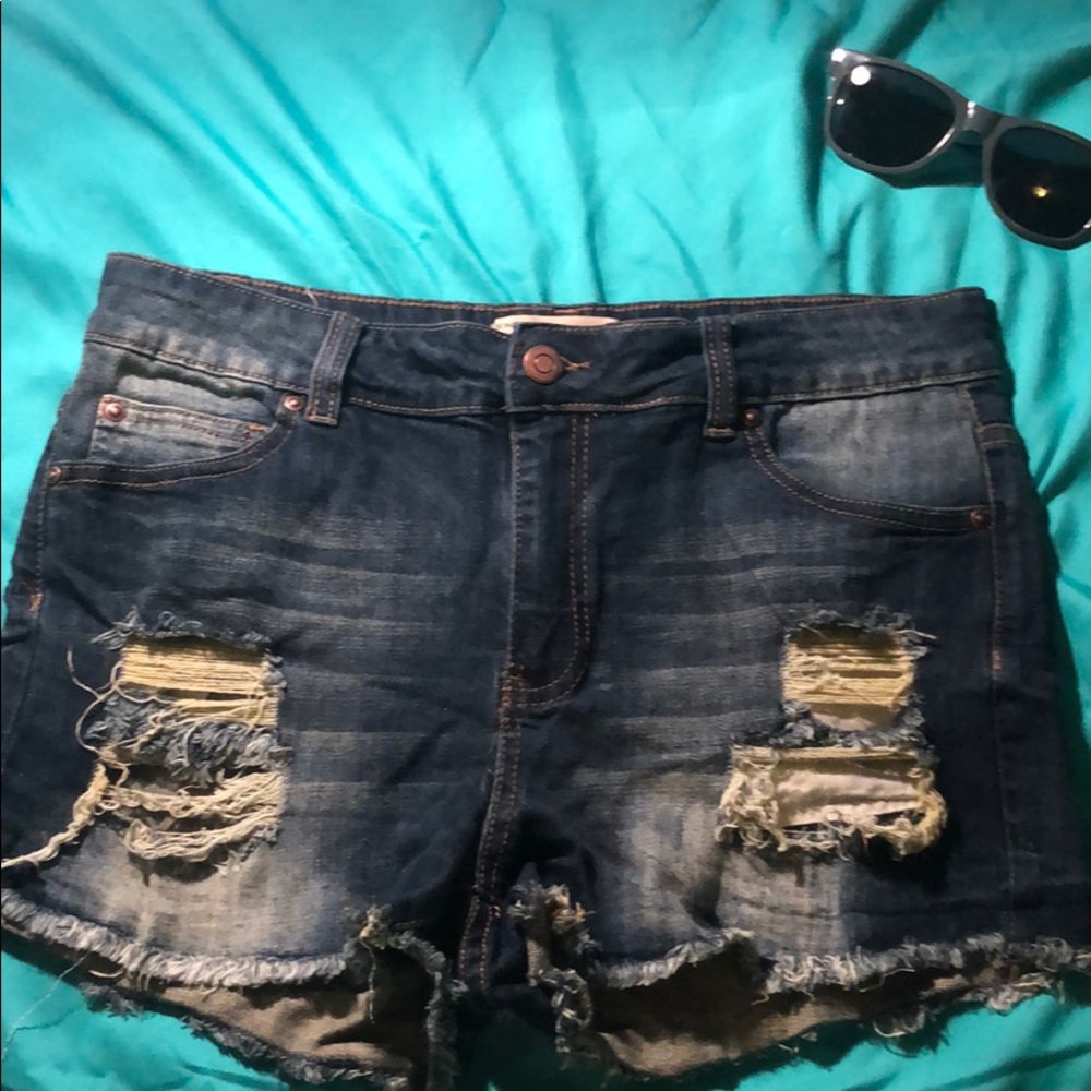 Ripped dark blue shorts